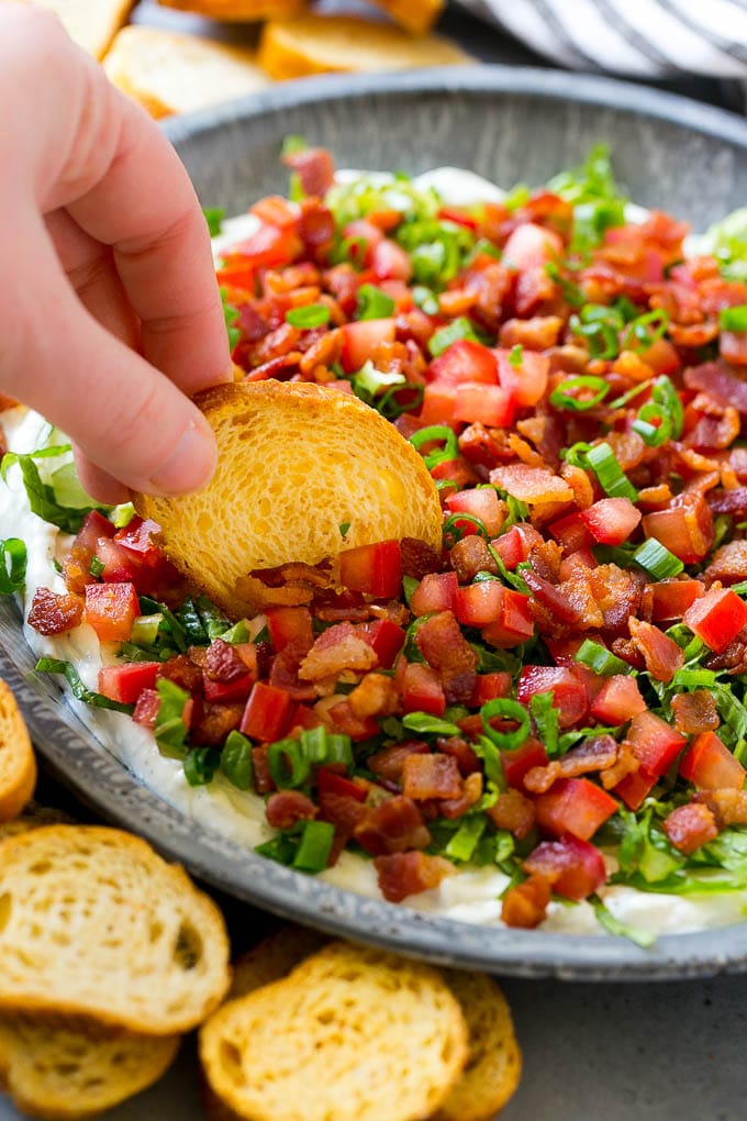 BLT Dip Recipe | Bacon Dip Recipe | Ranch Dip #dip #ranch #bacon #lettuce #tomato #appetizer #sadud BLT dip with bacon, lettuce, tomato and green onions over a creamy ranch dip.