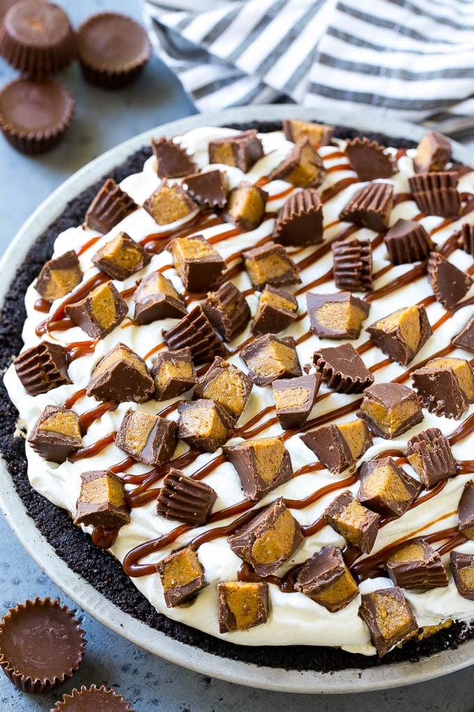 Chocolate Peanut Butter Pie Recipe | Peanut Butter Cup Pie | Peanut Butter Pie | No Bake Pie #chocolate #peanutbutter #pie #nobake #dessert #sadud A peanut butter pie with cookie crust, peanut butter filling, whipped cream topping and chopped peanut butter cups.