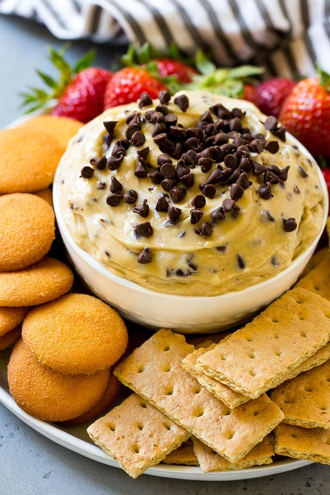 Cookie Dough Dip Recipe | Edible Cookie Dough | Chocolate Chip Cookie Dip #cookies #dip #cookiedough #dessert #snack #sadud Chocolate chip cookie dough dip, topped with mini chocolate chips and served with graham crackers and vanilla wafers.