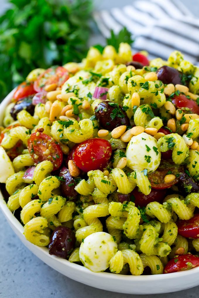 Pesto Pasta Salad | Italian Pasta Salad | Easy Pasta Salad #pasta #salad #pesto #olives #tomatoes #sadud Pesto pasta salad with tomatoes, olive and fresh mozzarella.