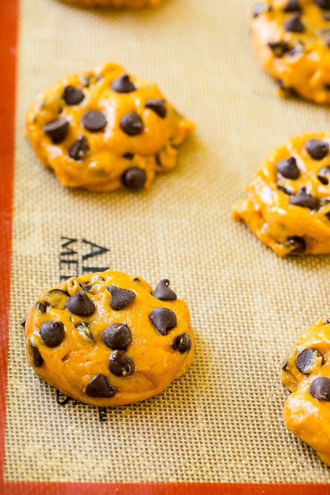 Pumpkin Chocolate Chip Cookies Recipe | Pumpkin Cookies | Pumpkin Chocolate Cookies #pumpkin #cookies #chocolate #baking #fall #sadud #dessert Dollops of dough on a baking sheet.