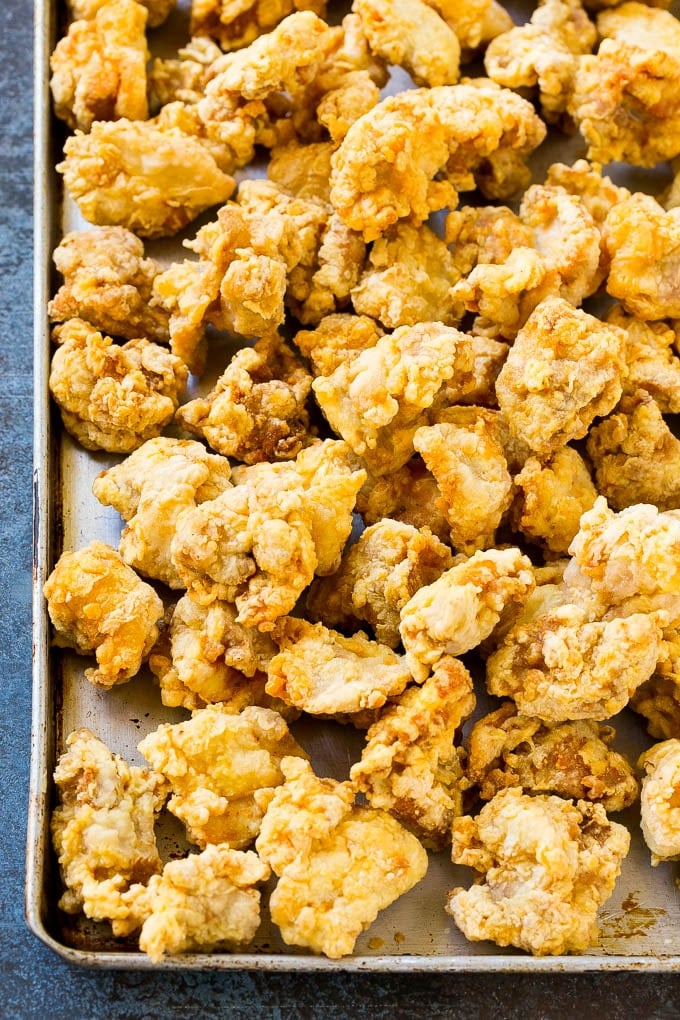 Orange Chicken Recipe | Chinese Orange Chicken | Panda Express Orange Chicken #orange #chicken #takeout #chinesefood #dinner #sadud Crispy fried chicken on a sheet pan.