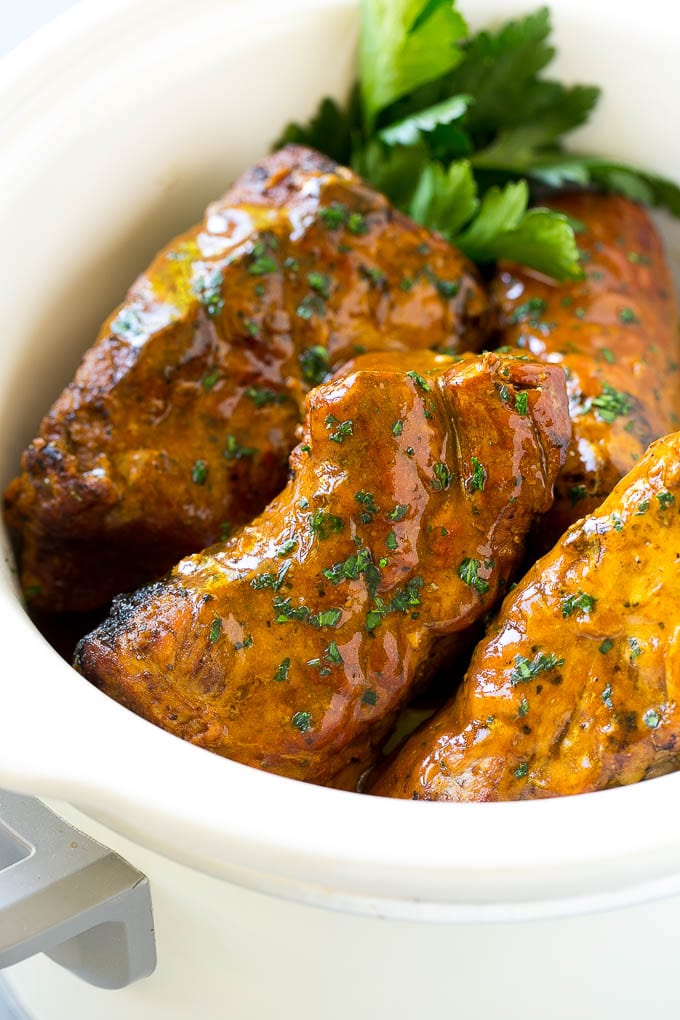 Slow Cooker Pork Tenderloin Recipe | Crock Pot Pork Tenderloin | Easy Pork Tenderloin #slowcooker #crockpot #pork #dinner #sadud Slow cooker pork tenderloins coated with sauce, inside a crock pot.