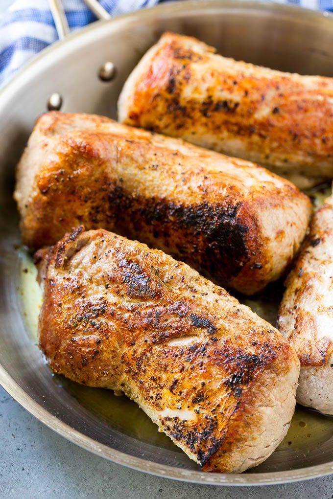 Slow Cooker Pork Tenderloin Recipe | Crock Pot Pork Tenderloin | Easy Pork Tenderloin #slowcooker #crockpot #pork #dinner #sadud Seared pork tenderloin in a skillet.