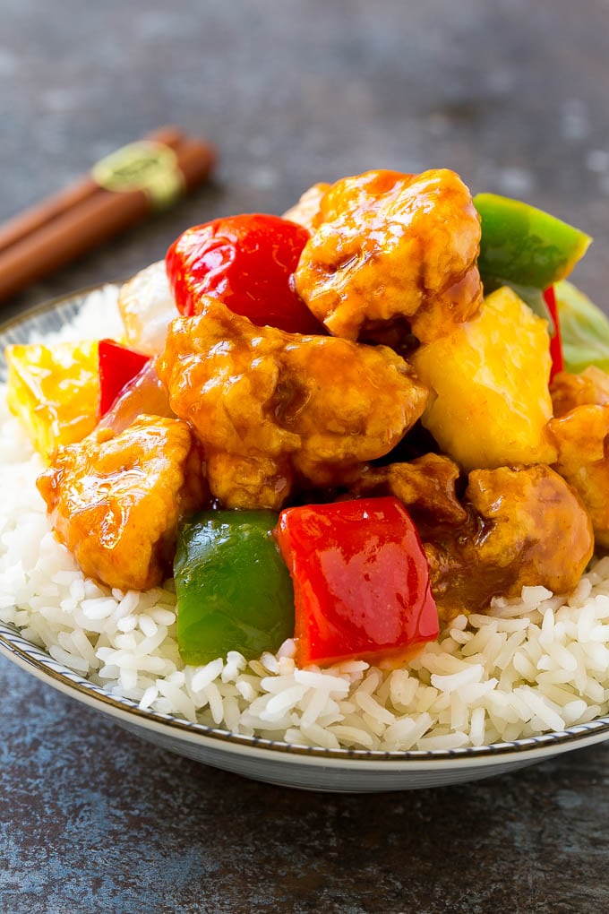 Sweet and Sour Chicken Recipe | Chinese Food Copycat Recipe | Chicken with Pineapple #chicken #chinesefood #pineapple #stirfry #takeout #dinner #sadud A bowl of sweet and sour chicken, served over steamed rice.