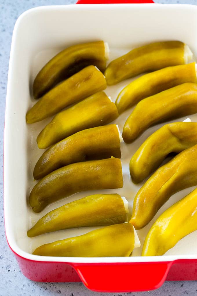 Chile Relleno Casserole Recipe | Baked Chile Rellenos | Mexican Casserole #casserole #chiles #mexican #cheese #dinner #sadud Cheese stuffed chiles in a baking dish.