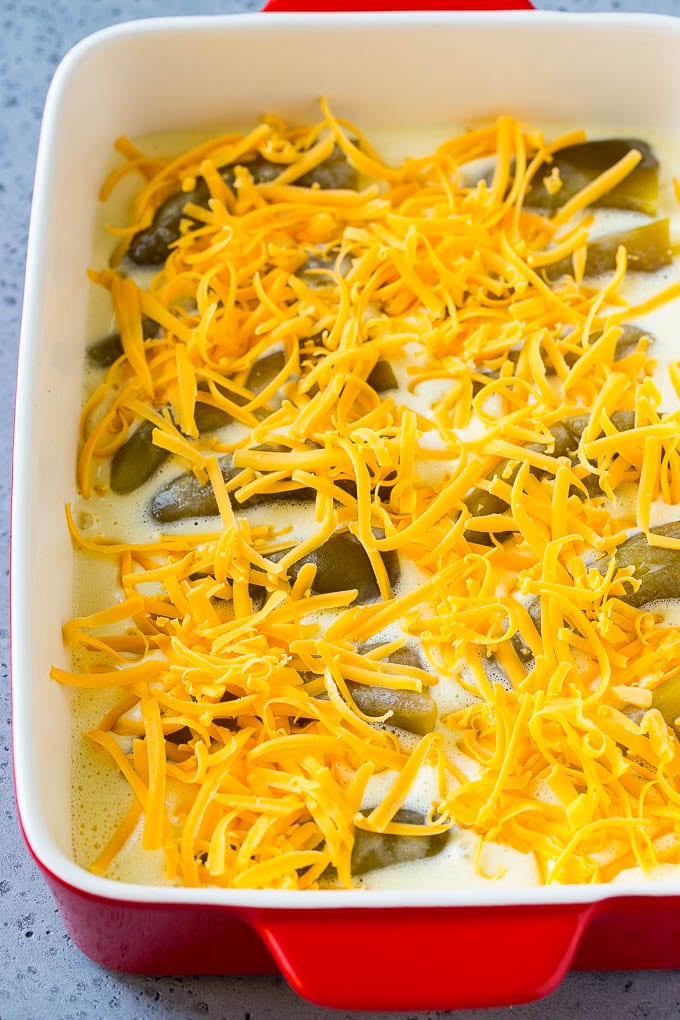 Chile Relleno Casserole Recipe | Baked Chile Rellenos | Mexican Casserole #casserole #chiles #mexican #cheese #dinner #sadud Green chiles in an egg batter topped with shredded cheddar cheese.