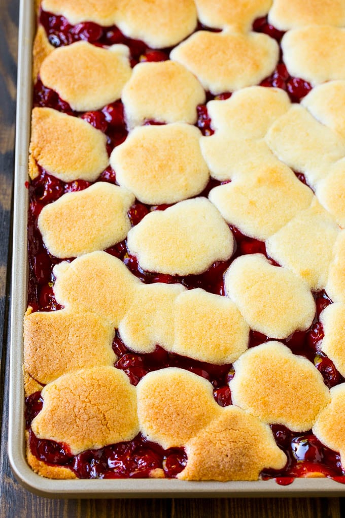 Cherry Bars Recipe | Cherry Pie Bars | Cherry Cookies | Bar Cookies #cookies #bars #cherry #baking #dessert #sweets #sadud A pan of baked dough and filling.