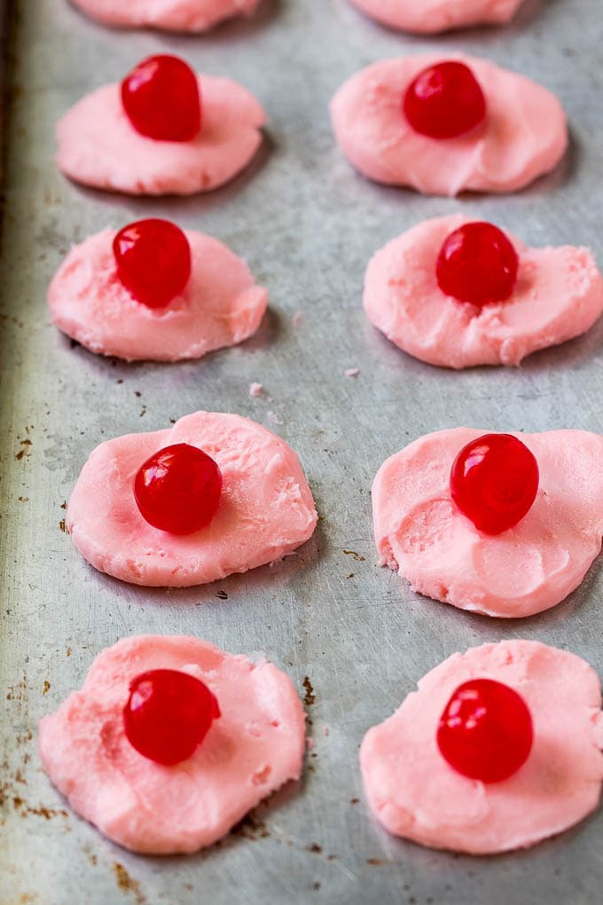 Chocolate Covered Cherries Recipe | Cherry Cordials | Cherry Candy #chocolate #candy #dessert #cherry #sweets #sadud Discs of cherry filling with a maraschino cherry on top.