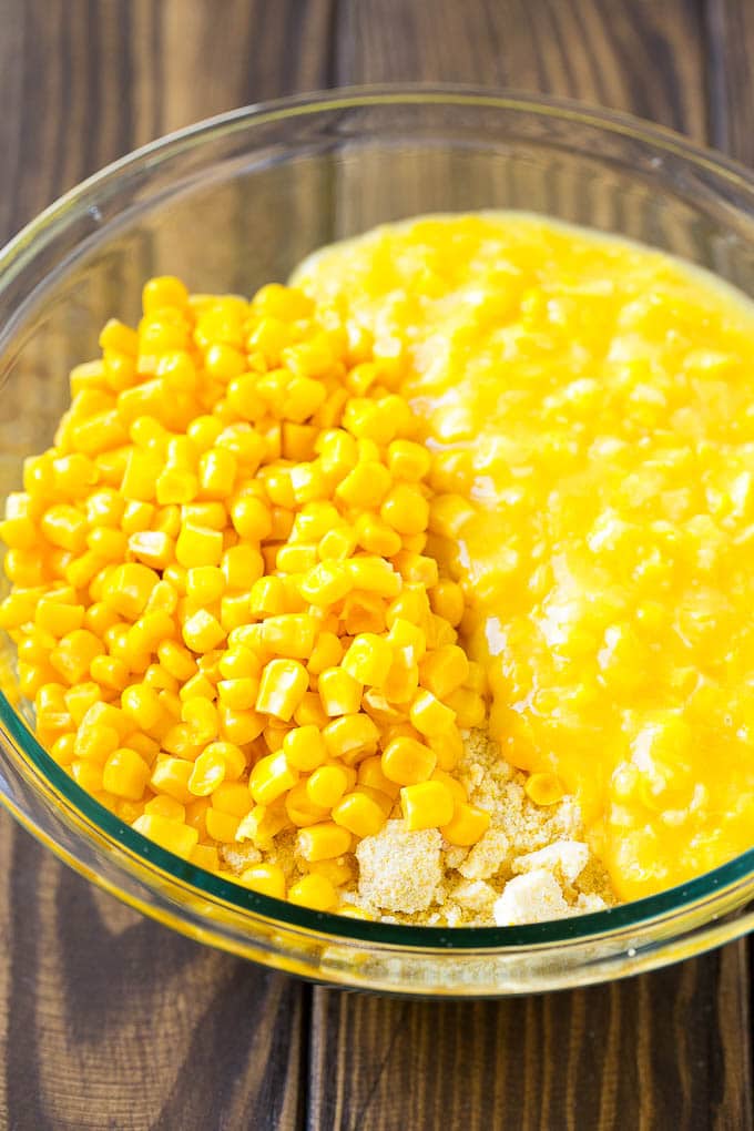 Corn Pudding Recipe | Corn Casserole | Corn Side Dish #corn #pudding #casserole #sidedish #thanksgiving #dinner #sadud Corn kernels, creamed corn and cornbread mix in a bowl.