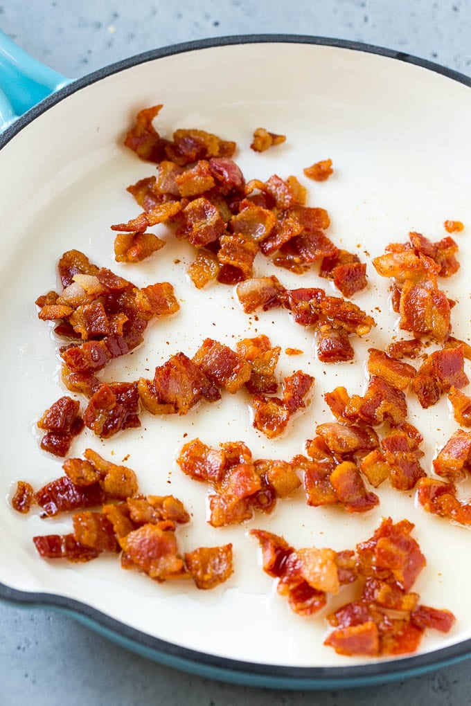 Fried Cabbage Recipe | Cabbage with Bacon | Cabbage Side Dish #cabbage #bacon #sidedish #lowcarb #keto #sadud Cooked bacon in a skillet.