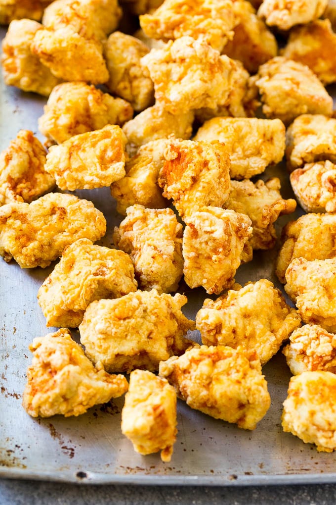 Sweet Chili Chicken Recipe | Thai Chicken | Asian Chicken #chicken #thaifood #chili #dinner #sadud Fried chicken breast pieces on a sheet pan.