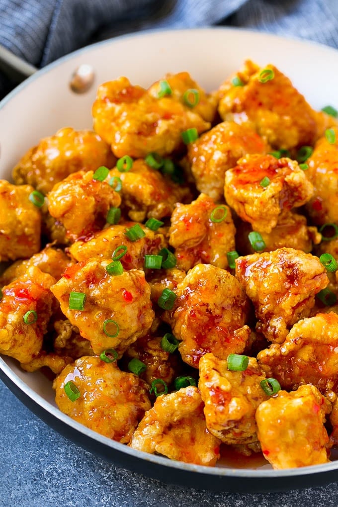 Sweet Chili Chicken Recipe | Thai Chicken | Asian Chicken #chicken #thaifood #chili #dinner #sadud Sweet chili chicken in a skillet, topped with sliced green onions.
