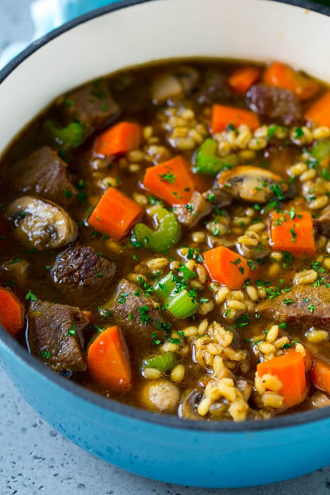 Beef Barley Soup Recipe | Beef Soup | Barley Soup #soup #beef #dinner #vegetables #sadud #comfortfood A pot of beef barley soup with mushrooms, carrots and celery.