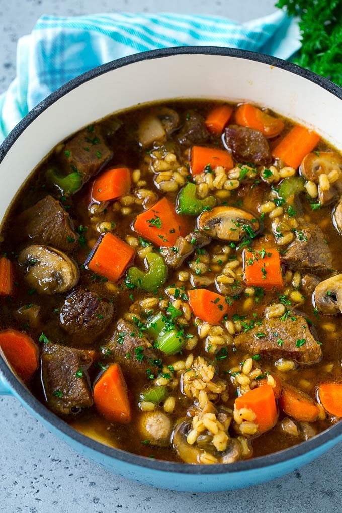 Beef Barley Soup Recipe | Beef Soup | Barley Soup #soup #beef #dinner #vegetables #sadud #comfortfood A pot full of beef barley soup made with beef stew meat, barley and vegetables all simmered together.