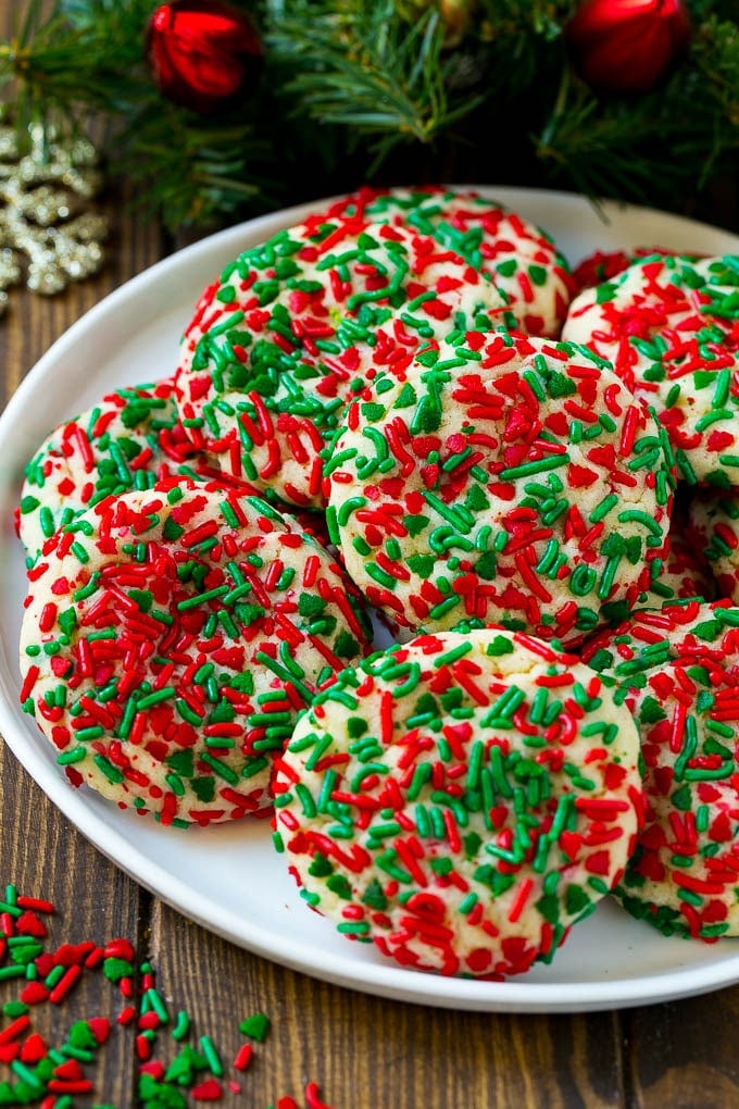 Cake Mix Cookies Recipe | Sprinkle Cookies | Christmas Cookies #cookies #christmas #sprinkles #dessert #baking #sadud A plate of cake mix cookies rolled in colorful sprinkles.