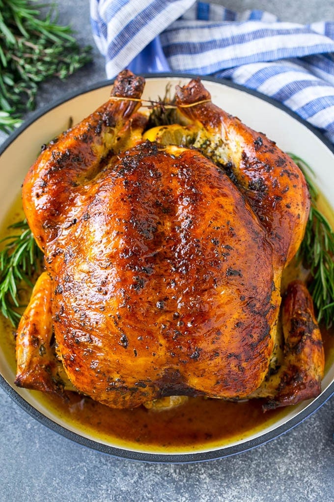 This chicken brine recipe is made with lemons, honey, fresh herbs and spices, and produces a juicy tender chicken every time! A foolproof way for succulent and flavorful roasted, smoked or fried chicken. A brined roasted whole chicken.