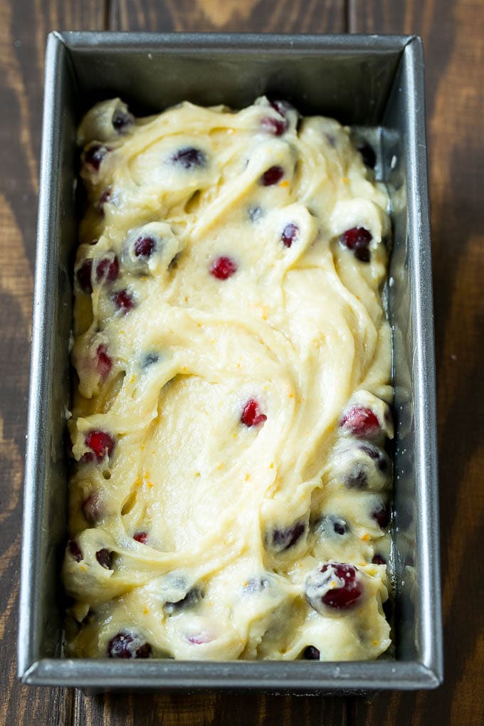 Cranberry Bread Recipe | Cranberry Loaf | Cranberry Orange Bread #cranberry #bread #baking #dessert #fall #sadud Ccranberry bread batter spread into a loaf pan.