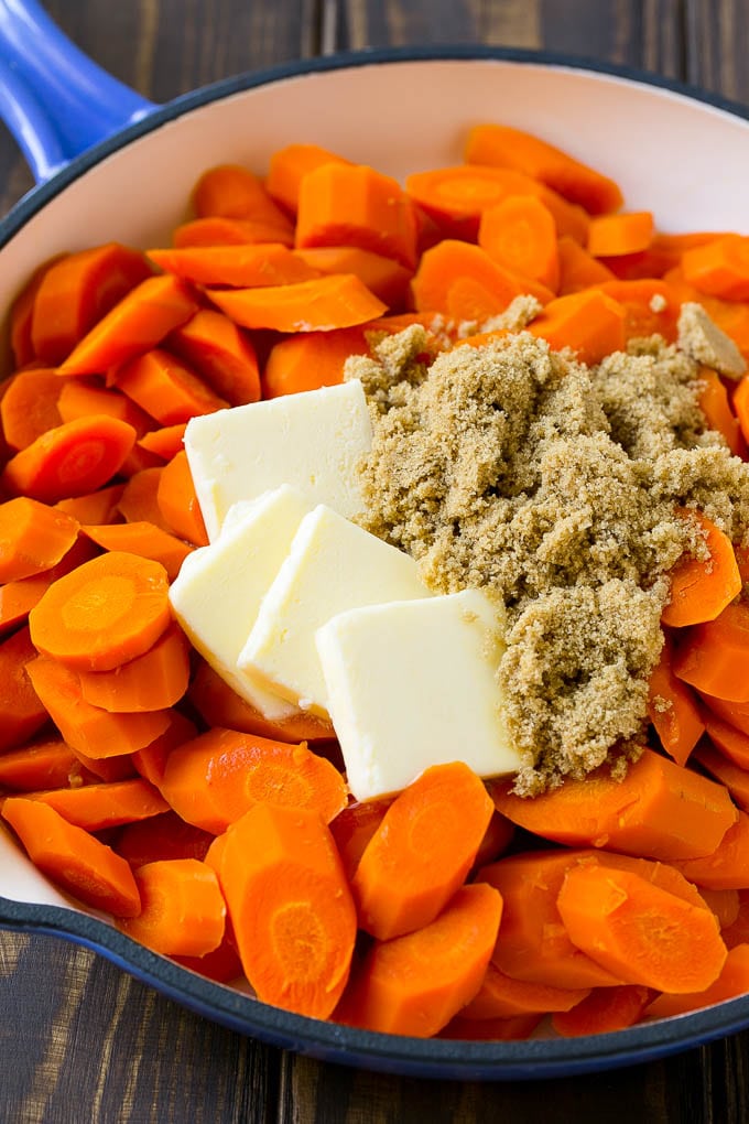 Glazed Carrots Recipe | Brown Sugar Carrots | Carrot Side Dish #carrots #brownsugar #sidedish #glutenfree #thanksgiving #fall #dinner #sadud Sliced cooked carrots with butter and brown sugar.