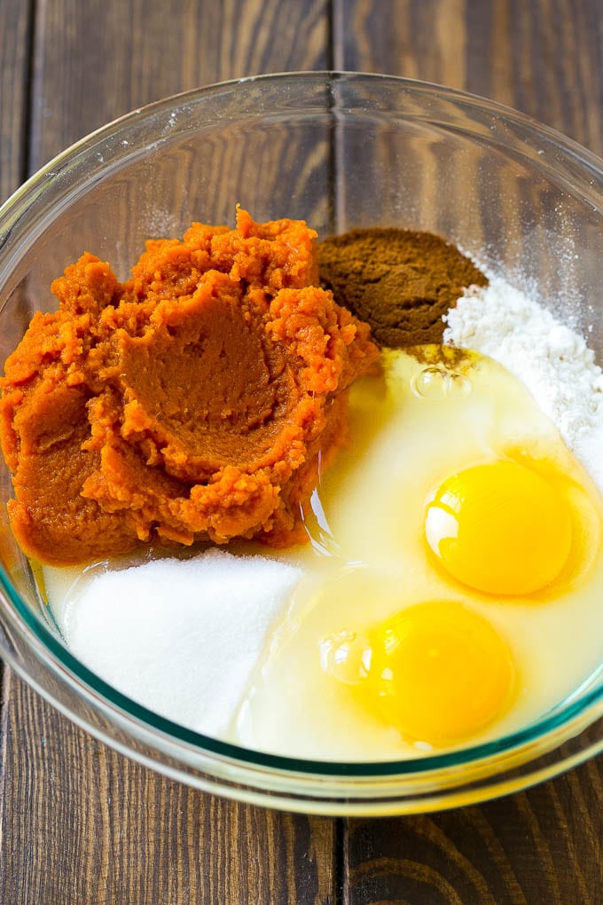 Pumpkin Chocolate Chip Bread Recipe | Pumpkin Bread | Chocolate Pumpkin Bread #pumpkin #bread #fall #chocolate #baking #dessert #sadud Sugar, eggs, pumpkin puree, flour and spices in a mixing bowl.