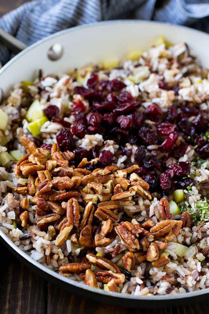 Wild Rice Pilaf Recipe | Thanksgiving Side Dish | Rice Pilaf #rice #apple #cranberry #fall #glutenfree #thanksgiving #sadud Apples and wild rice topped with dried cranberries, pecans and herbs.