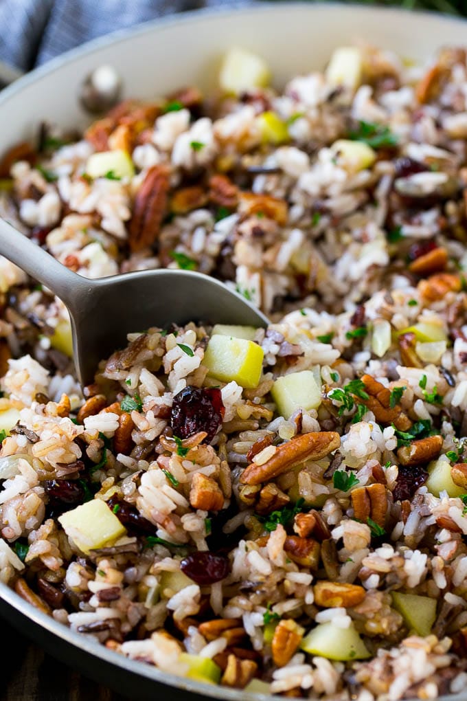 Wild Rice Pilaf Recipe | Thanksgiving Side Dish | Rice Pilaf #rice #apple #cranberry #fall #glutenfree #thanksgiving #sadud A skillet of rice pilaf with apples, cranberries and pecans.