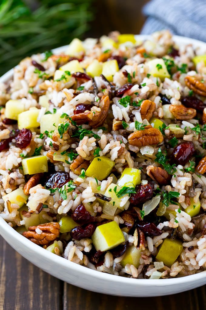 Wild Rice Pilaf Recipe | Thanksgiving Side Dish | Rice Pilaf #rice #apple #cranberry #fall #glutenfree #thanksgiving #sadud A serving bowl of rice pilaf made with wild rice, apples, cranberries and pecans.