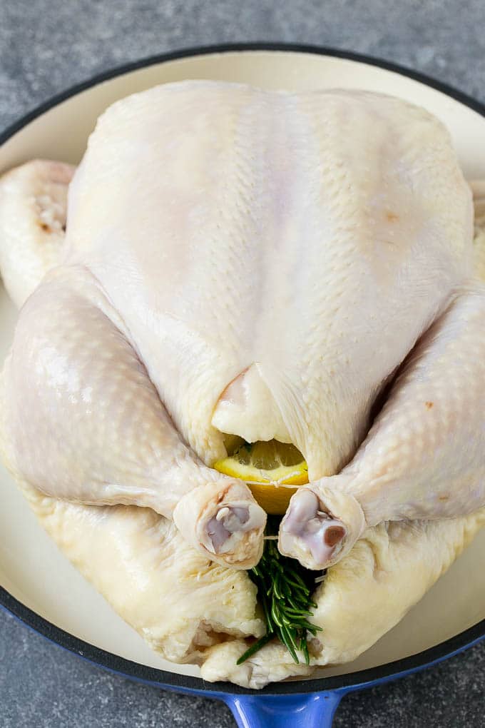 Roasted Chicken Recipe | Whole Roasted Chicken | Roast Chicken #chicken #dinner #lowcarb #keto #sadud A raw chicken stuffed with lemon, onion and herbs.