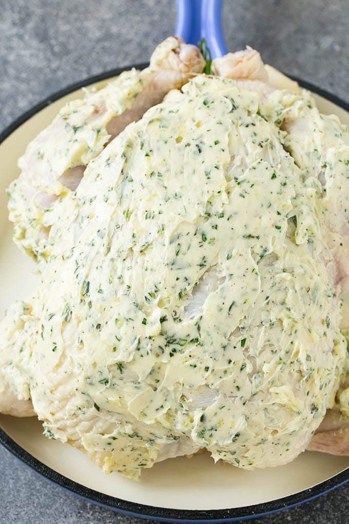 Roasted Chicken Recipe | Whole Roasted Chicken | Roast Chicken #chicken #dinner #lowcarb #keto #sadud A raw whole chicken coated in garlic and herb butter.