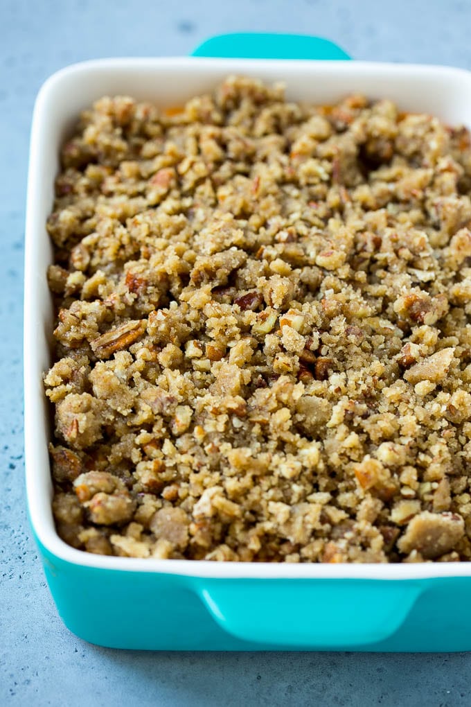 Ruth's Chris Sweet Potato Casserole Recipe | Sweet Potato Casserole | Mashed Sweet Potatoes #sweetpotatoes #casserole #thanksgiving #christmas #holidays #dinner #sadud #sidedish Mashed sweet potatoes topped with a brown sugar and pecan streusel.