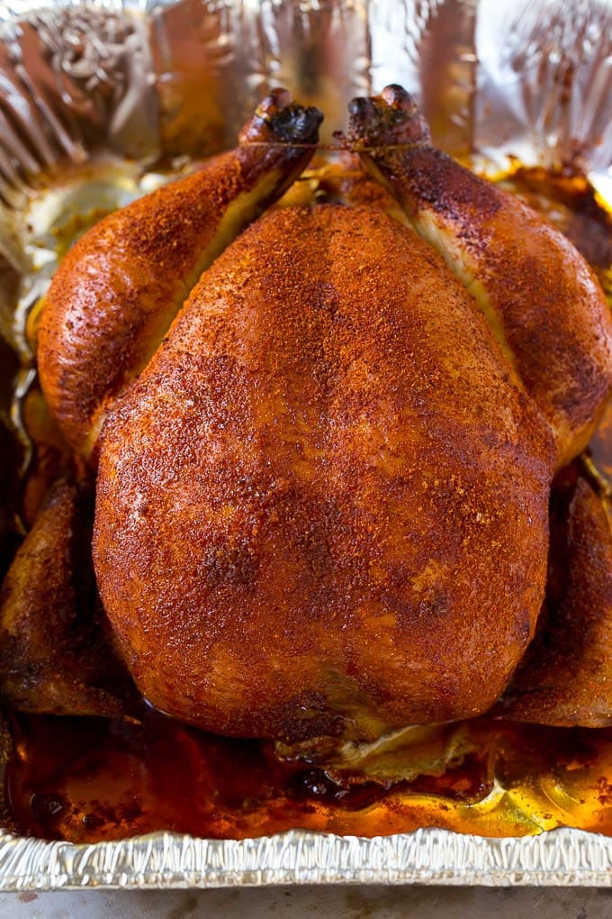 Smoked Chicken Recipe | Whole Smoked Chicken | BBQ Chicken #chicken #smoker #BBQ #dinner #sadud #glutenfree #lowcarb A whole smoked chicken in a roasting pan.