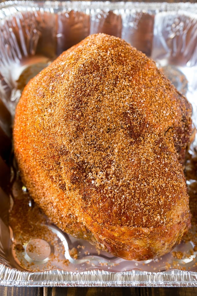 Brown Sugar Smoked Ham Recipe | Holiday Ham Recipe | Brown Sugar Glazed Ham #ham #christmas #thanksgiving #easter #smoker #dinner #brownsugar #sadud #glutenfree A ham crusted in homemade spice rub, ready to go into the smoker.