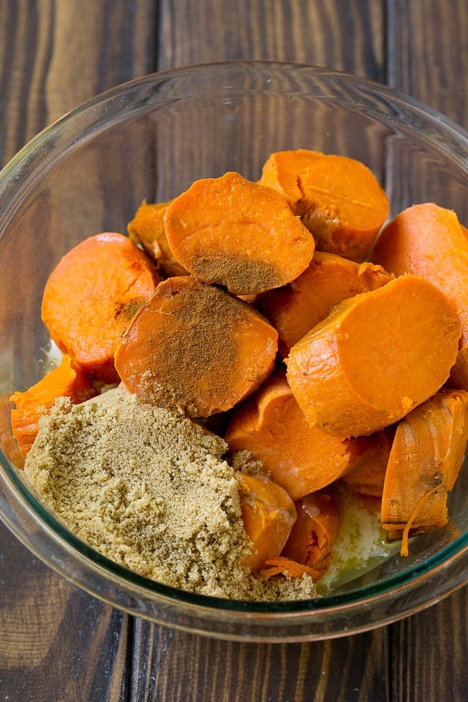 Sweet Potato Casserole with Pecans Recipe | Sweet Potato Casserole | Sweet Potato Side Dish #sweetpotatoes #thanksgiving #pecans #casserole #sidedish #holiday #fall #sadud Sliced sweet potatoes with brown sugar, butter and spices.