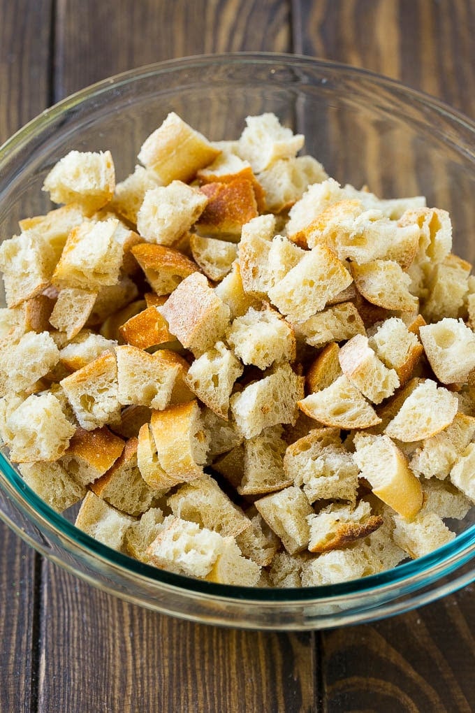 Turkey Stuffing Recipe | Thanksgiving Stuffing | Classic Stuffing #thanksgiving #stuffing #sidedish #fall #sadud Dried bread cubes in a mixing bowl.