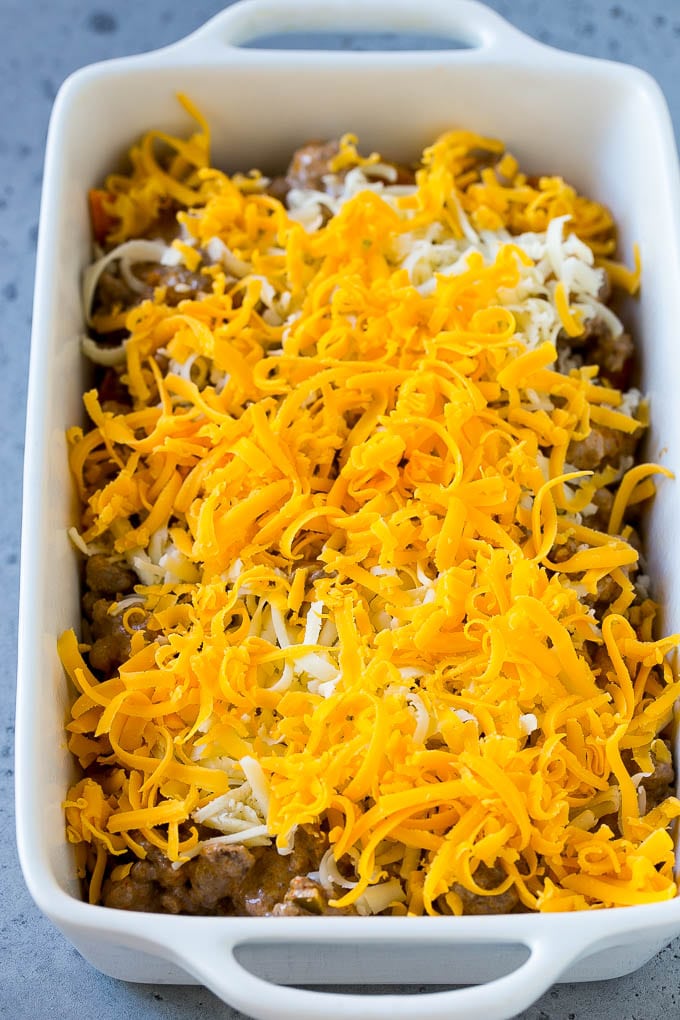 Dorito Casserole Recipe | Mexican Casserole | Beef Casserole #mexicanfood #beef #groundbeef #casserole #dinner #sadud A dish layered with chips, ground beef and shredded cheese.