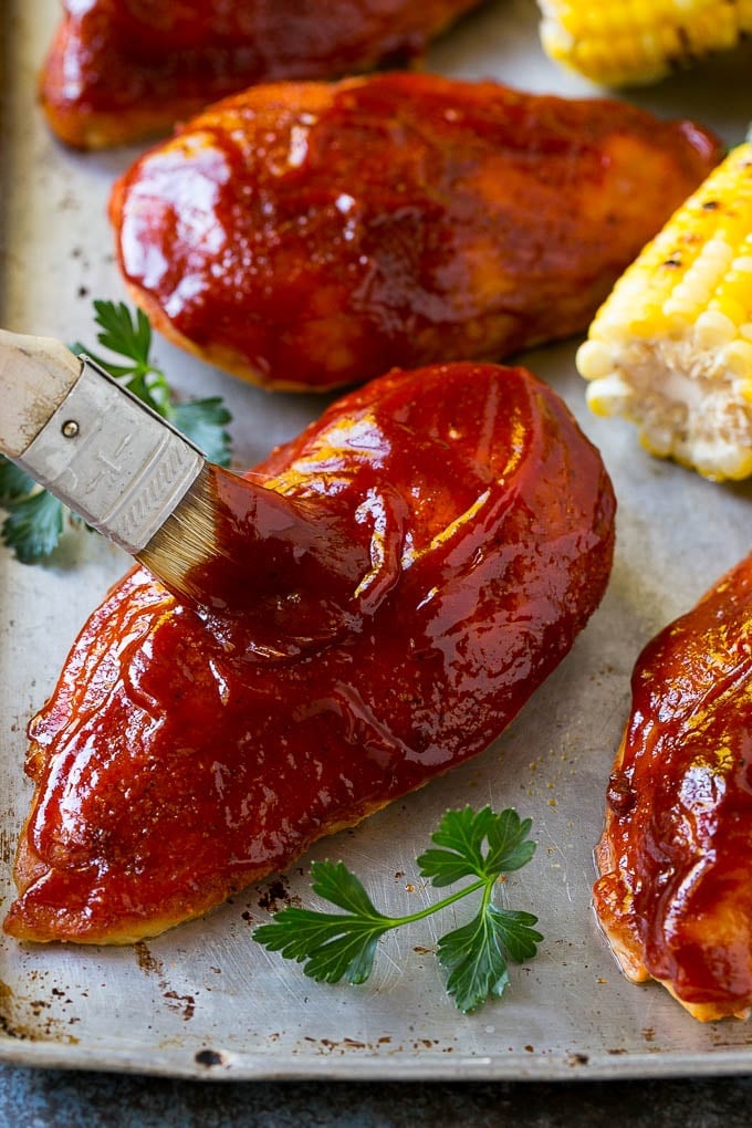 Smoked Chicken Breast Recipe | BBQ Chicken | Smoked Chicken #bbq #chicken #smoker #dinner #glutenfree #sadud Smoked chicken breasts being brushed with BBQ sauce.