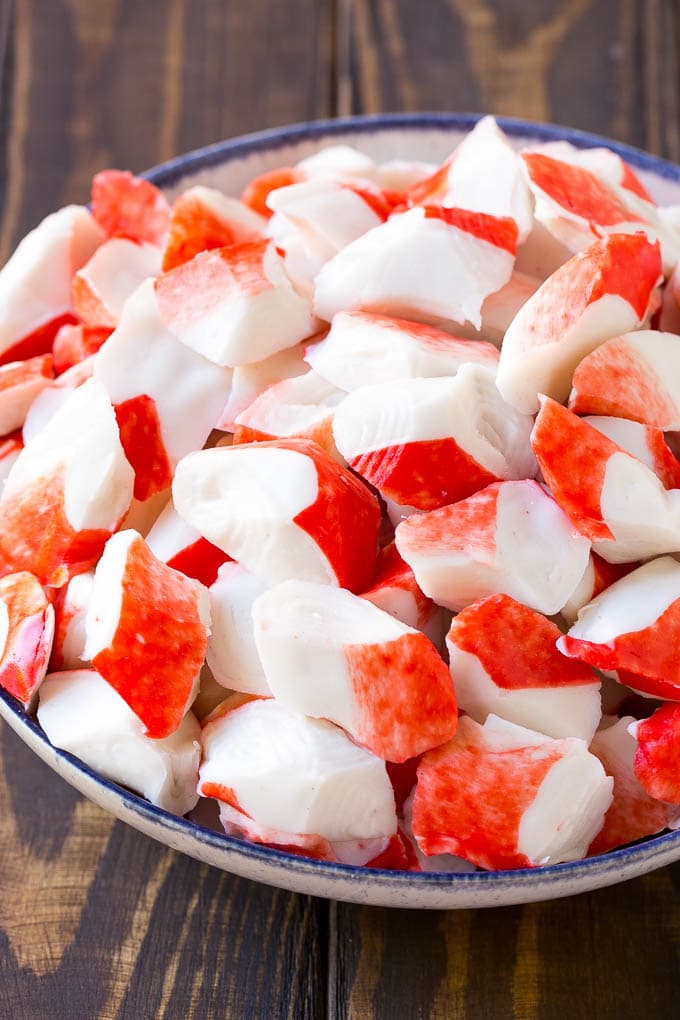 Crab Salad Recipe | Seafood Salad | Deli Salad #crab #salad #seafood #lowcarb #keto #lunch #dinner #sadud Imitation crab flakes in a bowl.