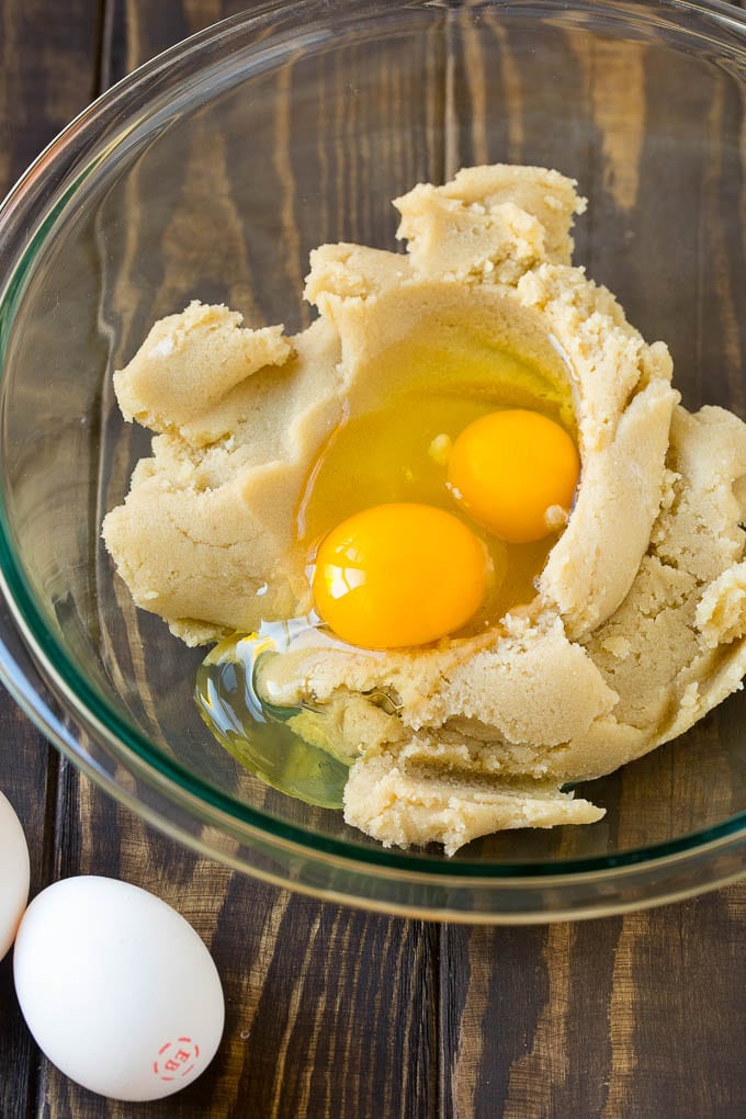 Eggnog Cookies Recipe | Holiday Cookies | Christmas Cookies #cookies #eggnog #baking #christmas #sprinkles #dessert #sadud Butter, sugar and eggs in a mixing bowl.
