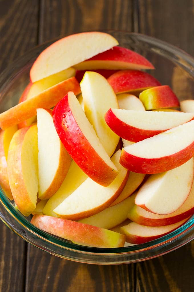 Fried Apples Recipe | Sauteed Apples | Cinnamon Sugar Apples #apples #cinnamon #sugar #sidedish #dessert #sadud #fall Sliced apples in a mixing bowl.