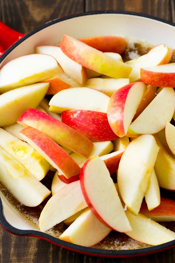 Fried Apples Recipe | Sauteed Apples | Cinnamon Sugar Apples #apples #cinnamon #sugar #sidedish #dessert #sadud #fall Sliced apples in a pan with butter, sugar and cinnamon.