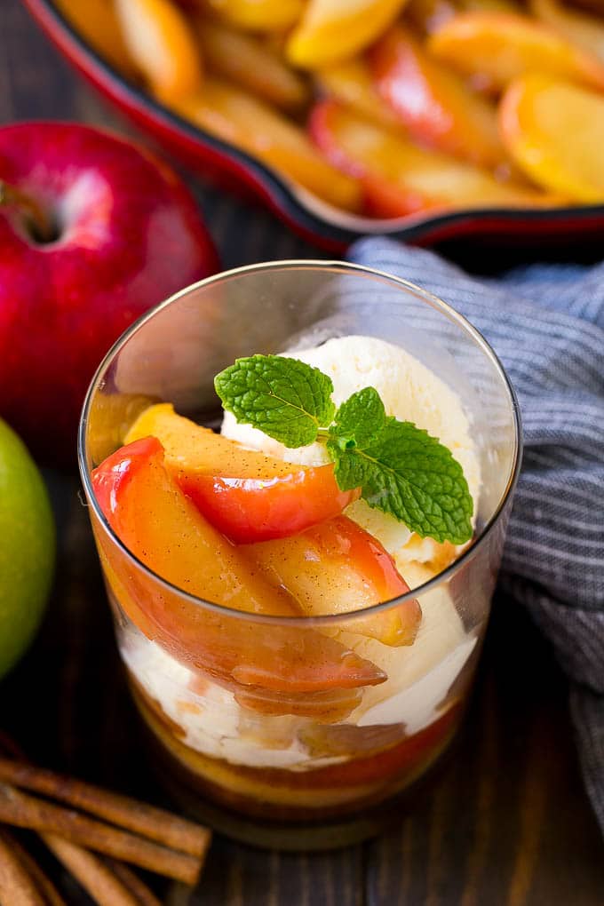 Fried Apples Recipe | Sauteed Apples | Cinnamon Sugar Apples #apples #cinnamon #sugar #sidedish #dessert #sadud #fall A cup of fried apples served with vanilla ice cream and garnished with fresh mint.