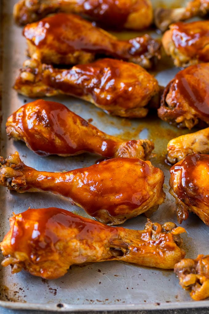 Slow Cooker Chicken Drumsticks Recipe | Crock Pot Chicken Drumsticks | BBQ Chicken Drumsticks #chicken #drumsticks #slowcooker #crockpot #bbq #dinner #sadud Slow cooker chicken drumsticks on a sheet pan, ready for the broiler.