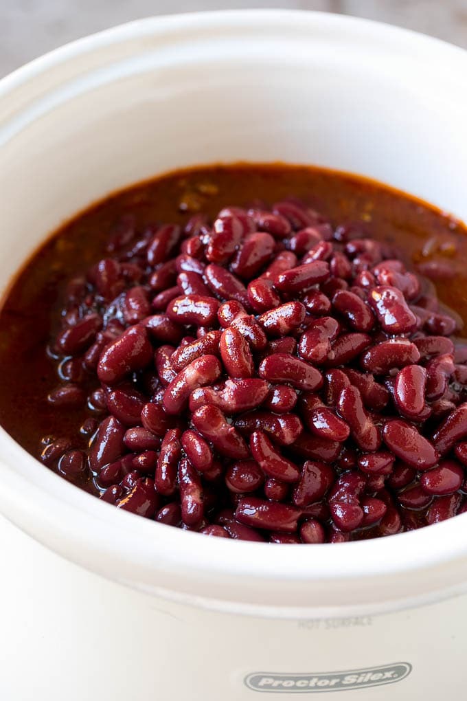 Kidney beans with beef chili in a slow cooker.