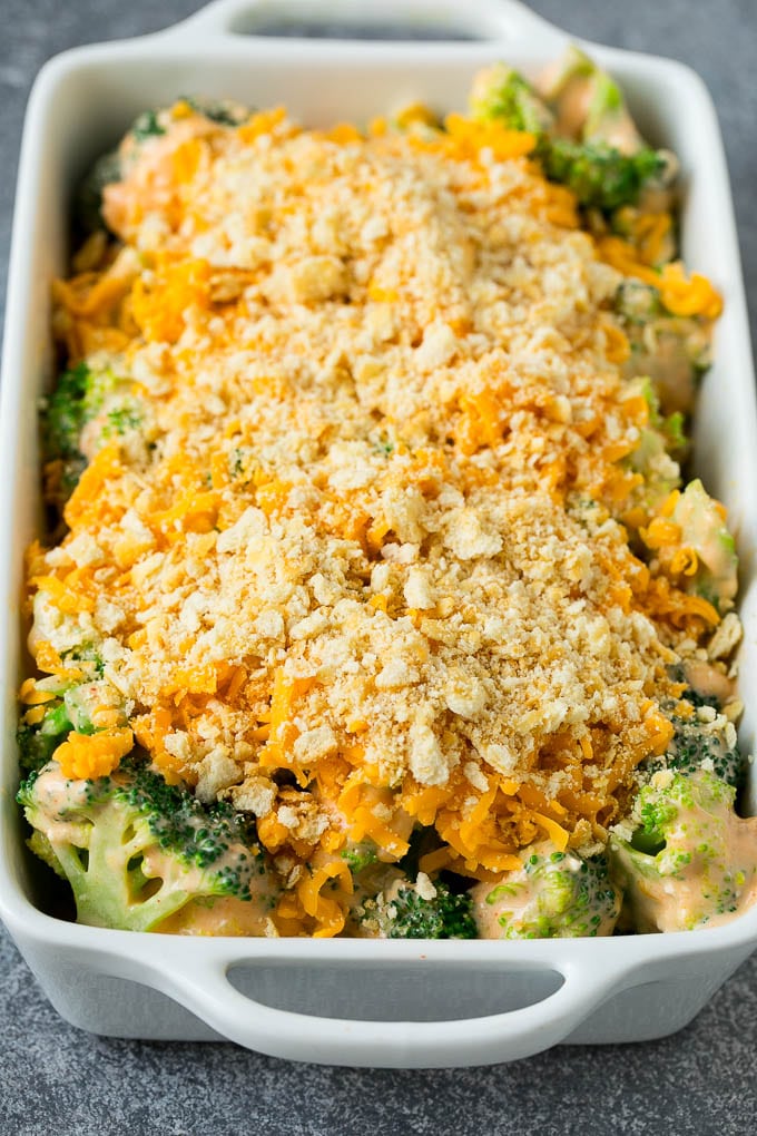 Broccoli Casserole Recipe | Broccoli and Cheese Casserole | Baked Broccoli #broccoli #cheese #casserole #sidedish #dinner #sadud Broccoli in cheese sauce topped with crushed crackers and shredded cheese.
