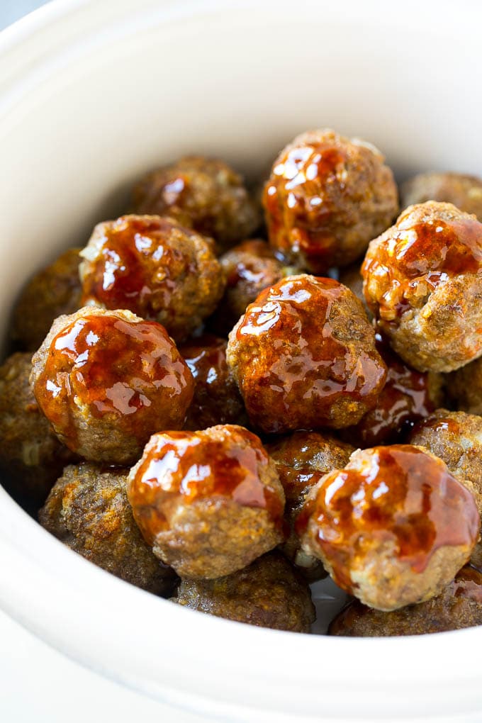 Sweet and Sour Meatballs Recipe | Slow Cooker Meatballs | Crockpot Meatballs | Cocktail Meatballs #meatballs #beef #slowcooker #crockpot #dinner #appetizer #sadud Meatballs in a slow cooker coated in sweet and sour sauce.