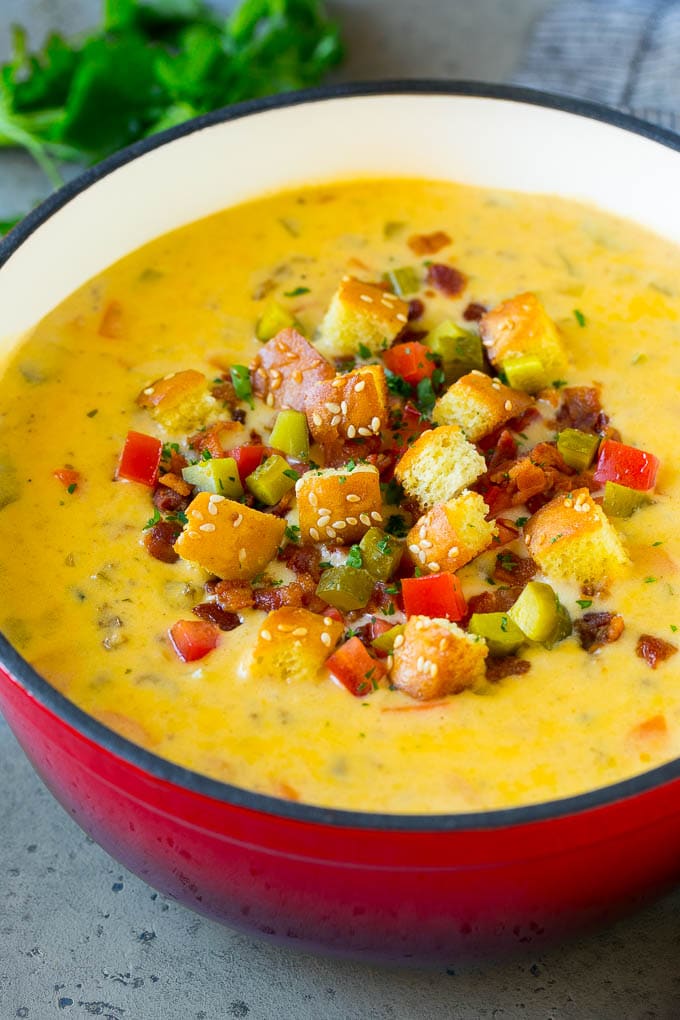 Cheeseburger Soup Recipe | Hamburger Soup | Cheese Soup #soup #groundbeef #hamburger #cheese #bacon #dinner #sadud Cheeseburger soup topped with bacon, tomato, pickles and croutons.