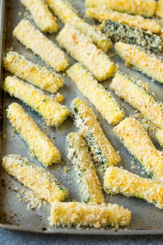 Fried Zucchini Recipe | Zucchini Fries | Zucchini Recipe #appetizer #zucchini #snack #sadud Sticks coated in egg, parmesan and breadcrumbs.