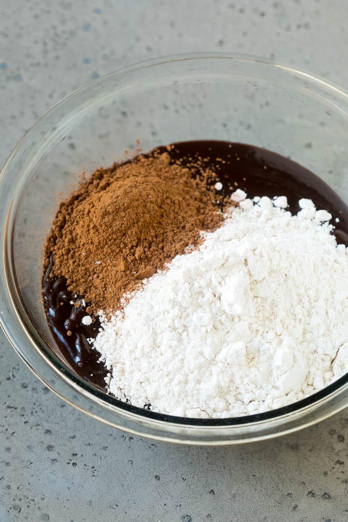 Oreo Brownies Recipe | Homemade Brownies | Chocolate Chip Brownies #brownies #oreos #chocolate #dessert #sweets #sadud Melted chocolate, sugar, cocoa powder and flour in a mixing bowl.
