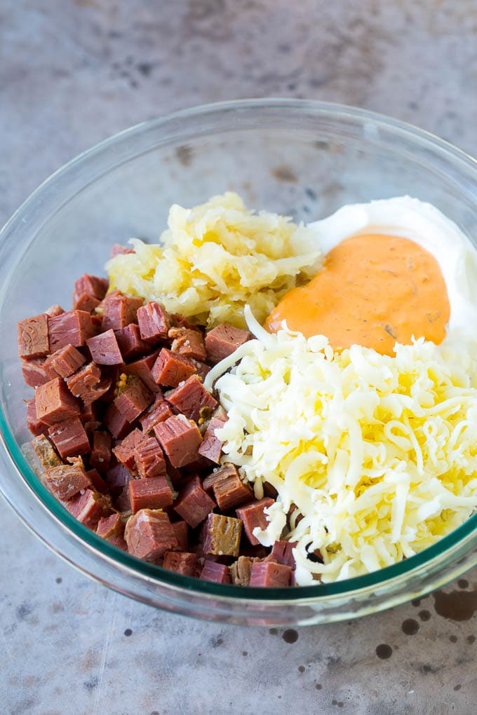 Reuben Dip Recipe | Corned Beef Dip | Cheese Dip #dip #cheese #cornedbeef #appetizer #lowcarb #keto #sadud Corned beef, cream cheese, Thousand Island dressing and cheese in a bowl.