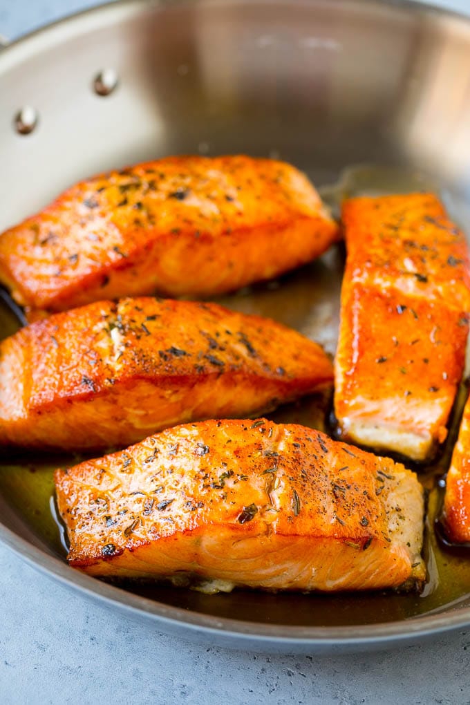 Greek Salmon Salad Recipe | Low Carb Salmon Recipe | Salmon Salad #salmon #seafood #fish #lowcarb #keto #lunch #sadud #healthy Seared fish fillets in a skillet.